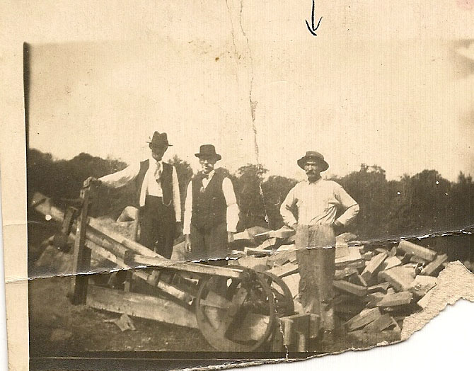Darias Oliver Jr. cutting firewood