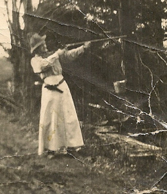 Hannah O'Dell Oliver with gun