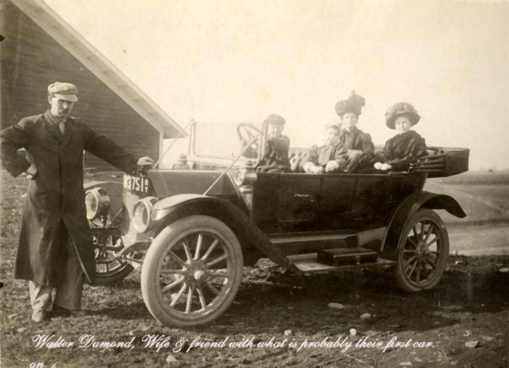Walter Dumond and wife with car